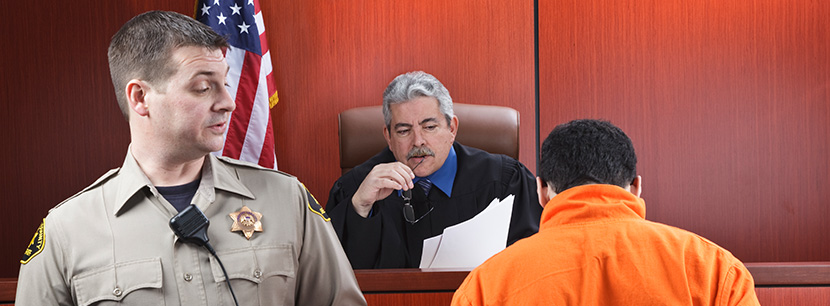 Judge and prisioner in courtroom