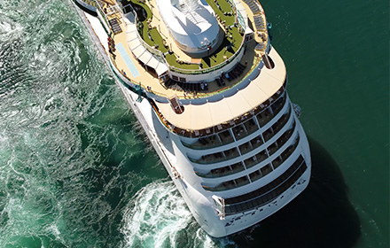 Bird's-Eye View of the Back of a Cruise Ship To Represent All the Incidents That Could Occurr on Board